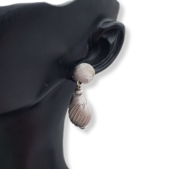 Monet Jewelry - Vintage Monet Silvertone Textured Swirl Teardrop Dangle Clip-On Earrings